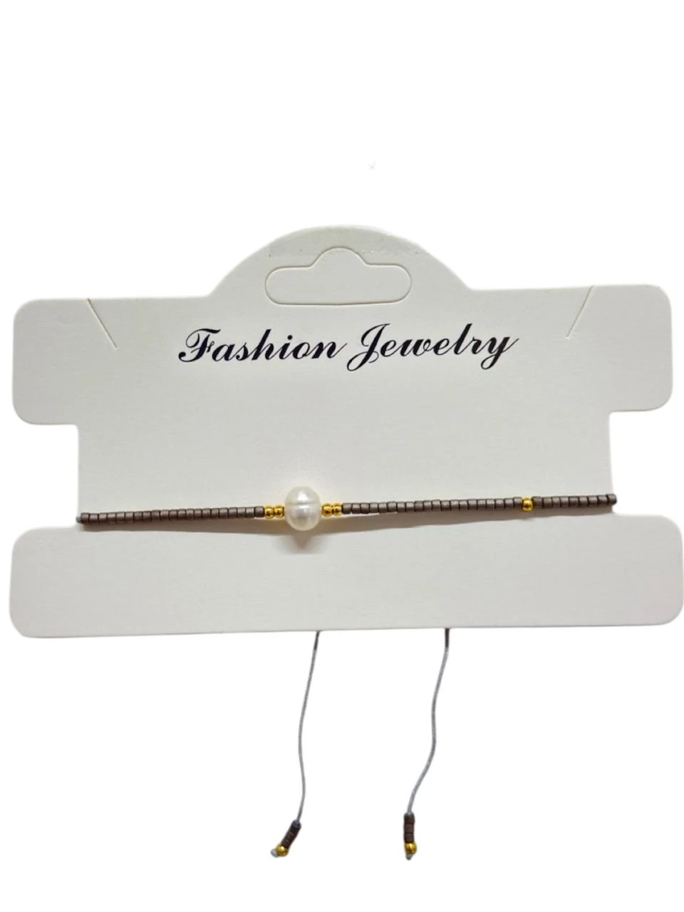 Pulsera hilo perla y canutillos nude